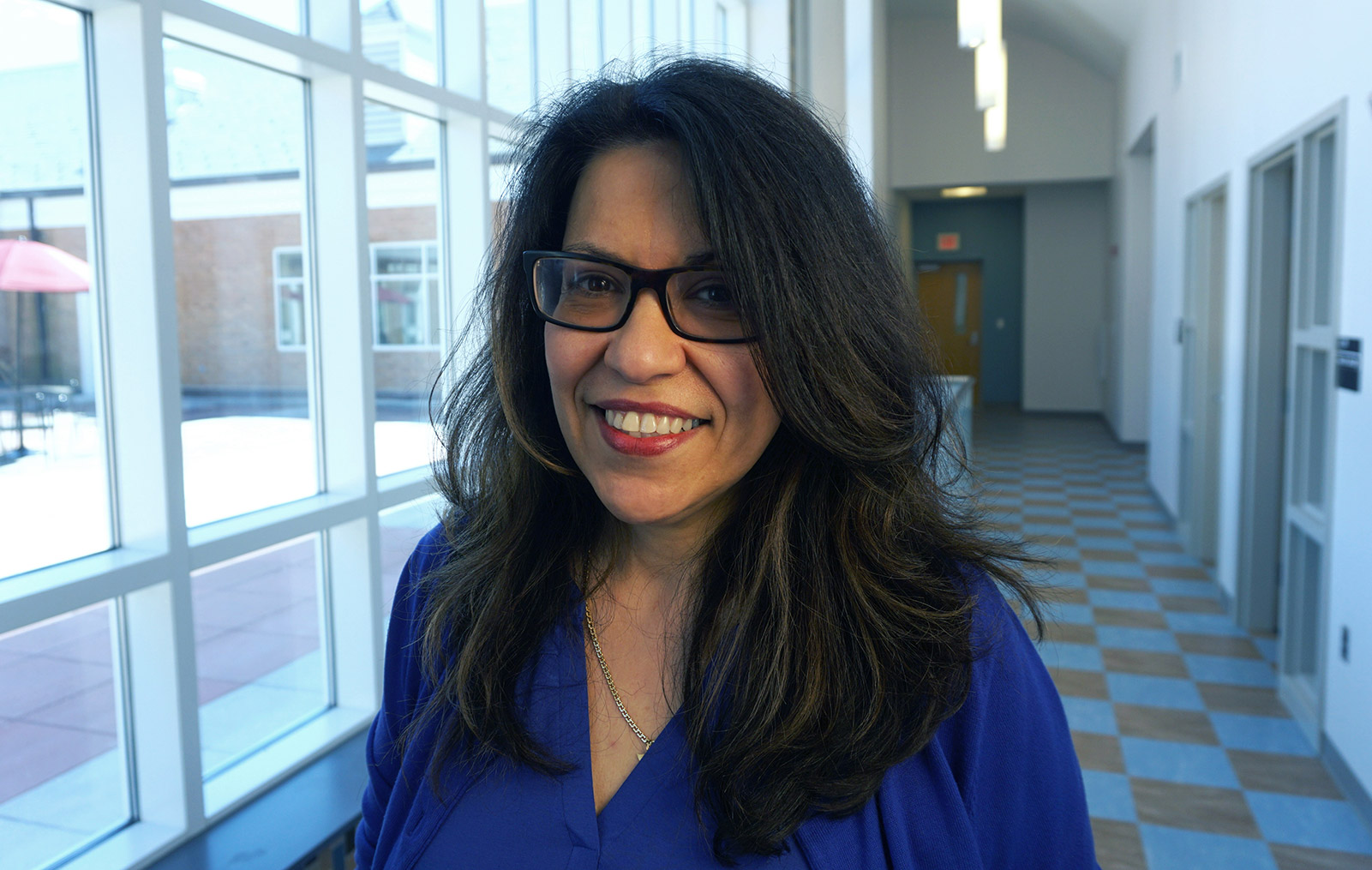 headshot of Nancy Mirabal inside a building